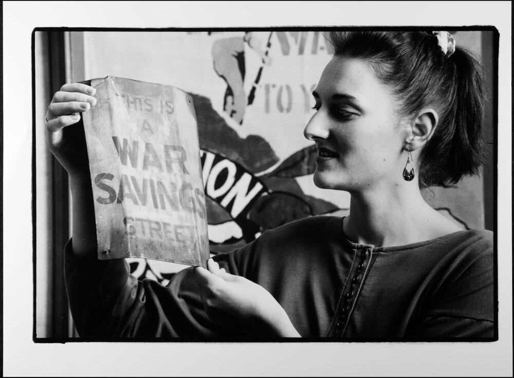 University Library Archives. Iris Kemp with &lsquo;War Savings Street&rsquo; sign