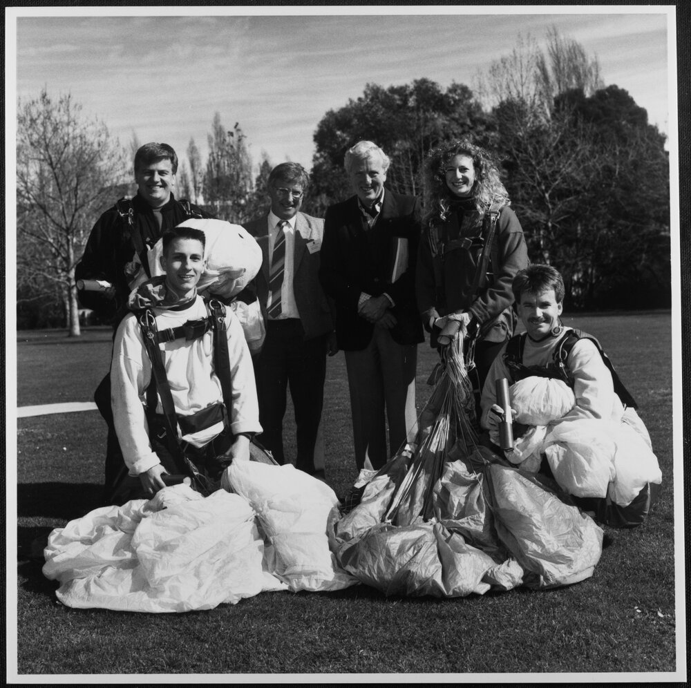 Discovery Day - Vice-Chancellor David Penington with skydivers. 1991