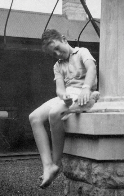 Malcolm Fraser as a boy, with his pet galah, at Balpool-Nyang, New South Wales.