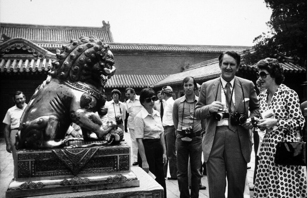 Malcolm and Tamie Fraser admire a lion statue at the Summer Palace in Beijing, China.