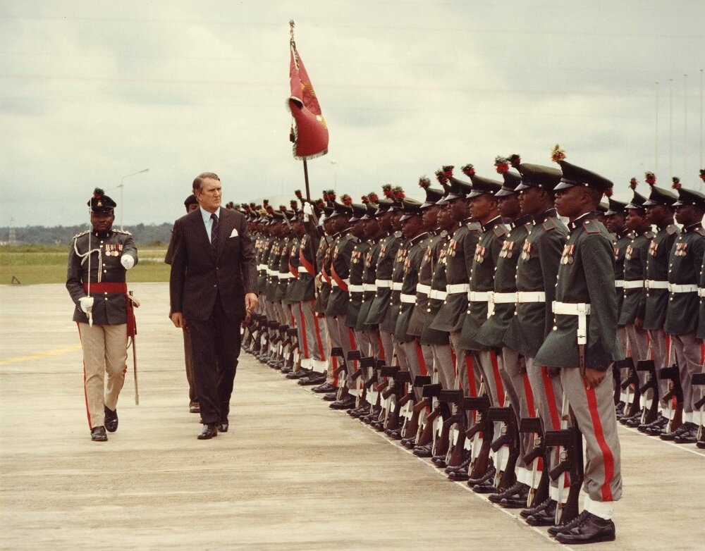 Prime Minister Malcolm Fraser inspecting a guard of honour on his arrival in Lagos, Nigeria in July 1979.