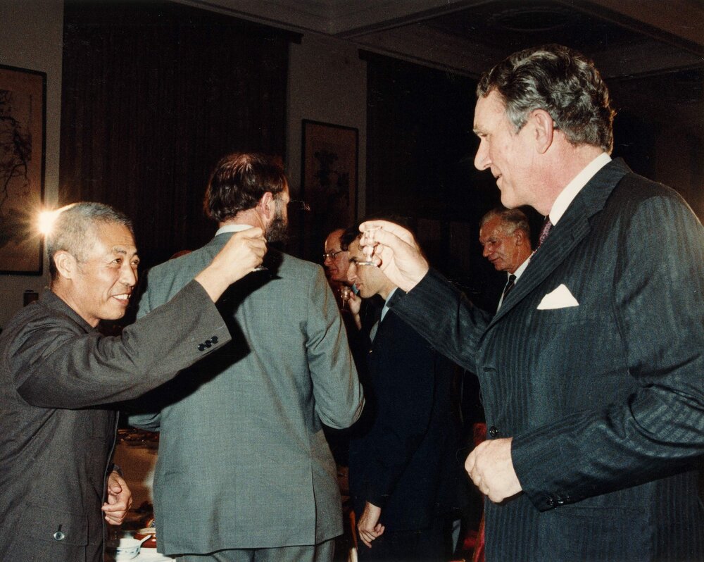 Malcolm Fraser and Han Xu, Vice Foreign Minister of China, toasting each other at a function in Beijing, China.