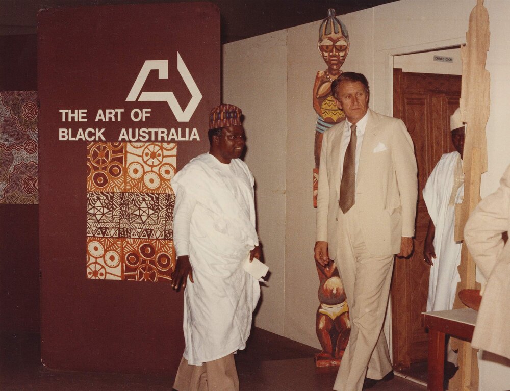 Prime Minister Malcolm Fraser visiting an exhibition of Australian Aboriginal art  in Lagos, Nigeria.