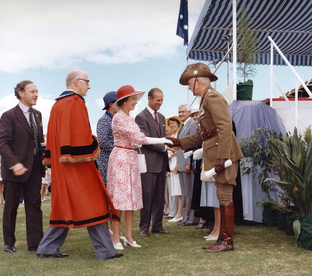 Queen Elizabeth II greeting an Australian WW1[?] Light Horse soldier at an event in a New South Wales town during her 1977 official visit to Australia.