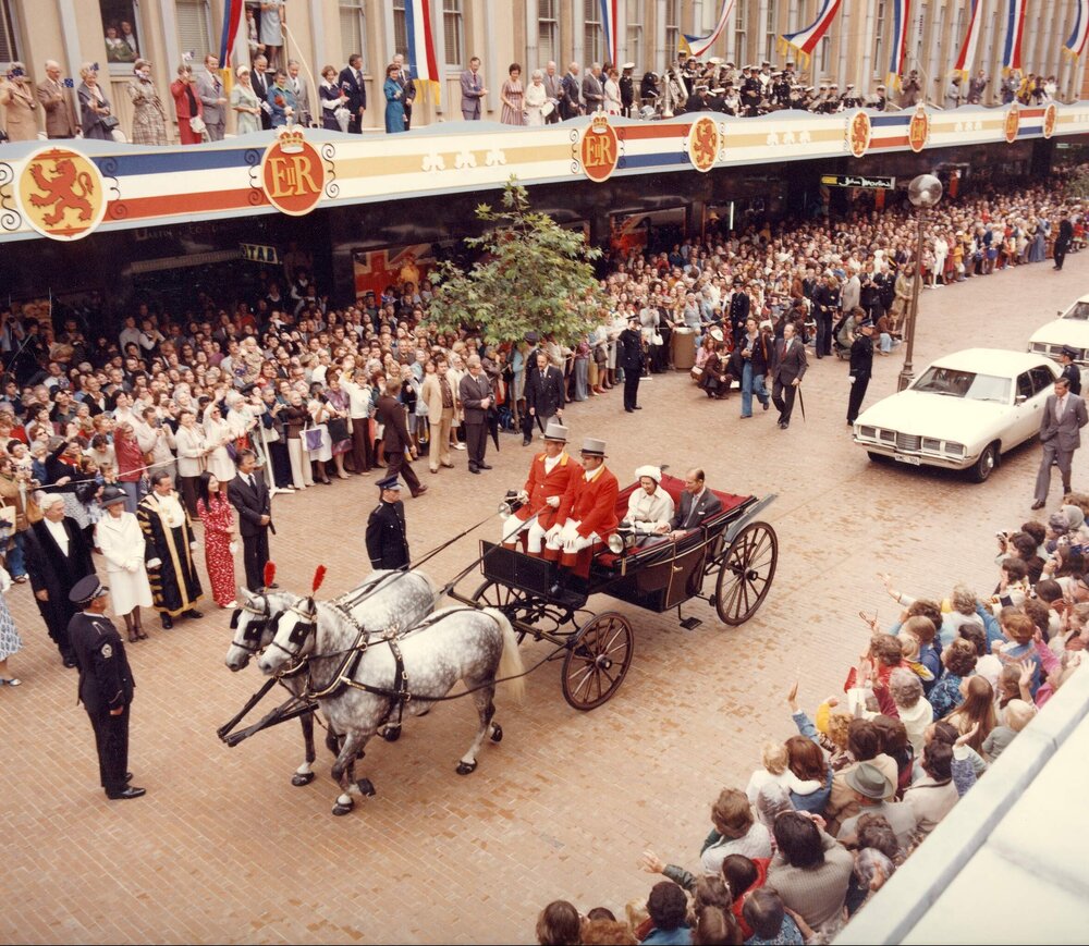 Queen Elizabeth II and the Duke of Edinburgh seated in a horsedrawn landau in Rundle Mall, Adelaide, during their 1977 official visit to Australia.