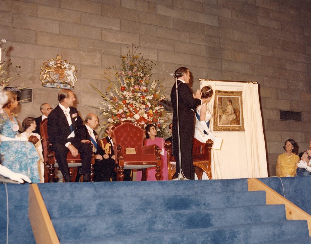 Queen Elizabeth II unveiling a Renoir painting at the National Gallery of Victoria in Melbourne during her 1977 official Australian visit.