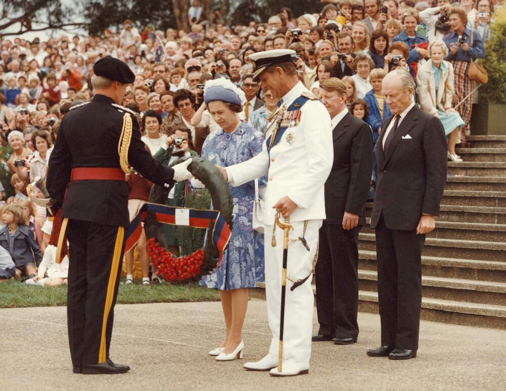 Queen Elizabeth II and the Duke of Edinburgh at a dedication of a memorial for the Royal Regiment of Australian Artillery Canberra, during their 1977 official visit to Australia.