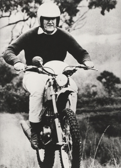 Malcolm Fraser riding a trail bike in about 1980.