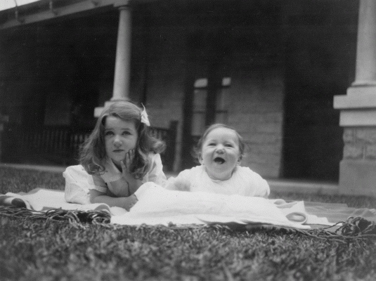 Malcolm Fraser as a baby with his older sister Lorraine in the garden at Balpool-Nyang, New South Wales.