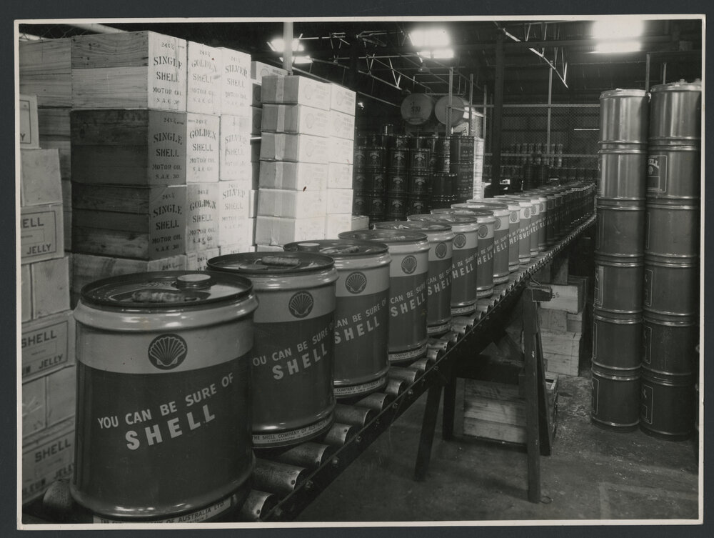 Photographs of lube oil plant, filling, stacking and cleaning of drums [1 of many]