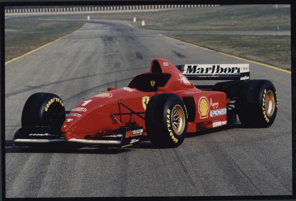 Photographs of motor sports events, vehicles and drivers [10 of many]