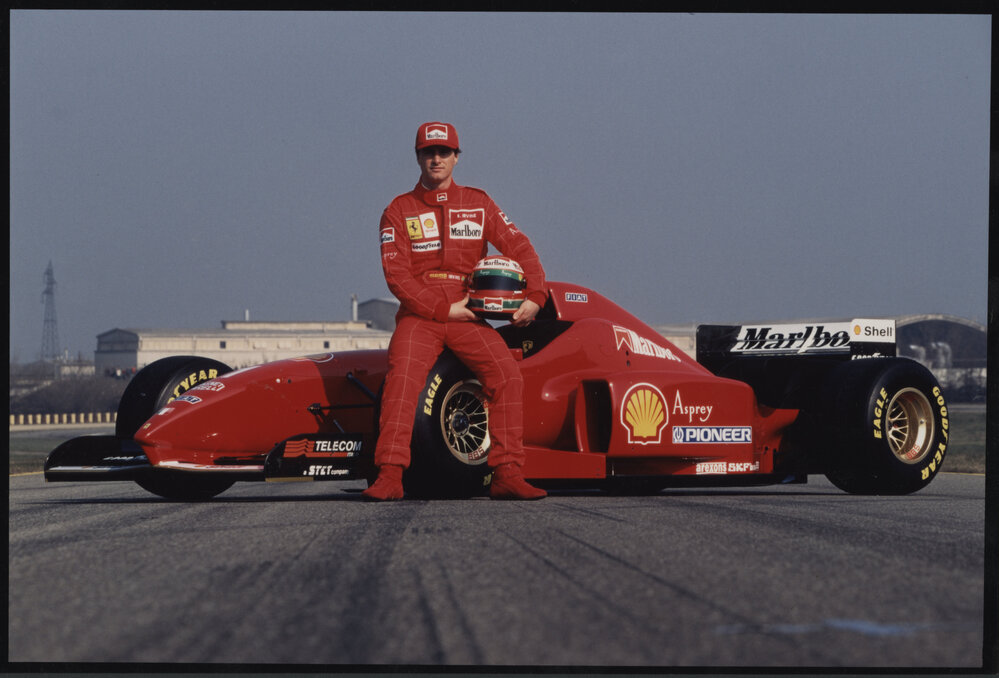 Photographs of motor sports events, vehicles and drivers [12 of many]