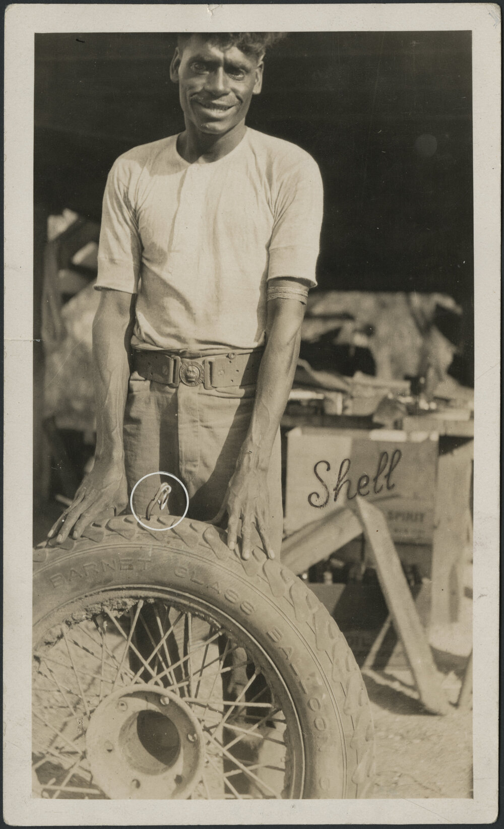 [Man holding wheel]