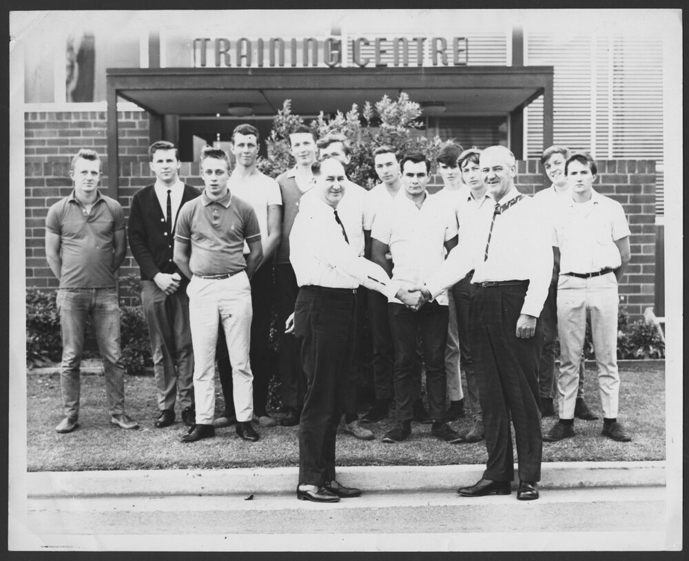 Photographs of workers at their jobs, special events, and training courses [5 of many]