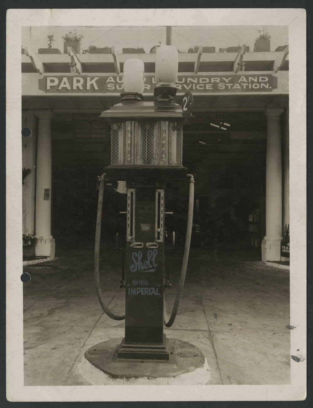 Photographs of petrol pumps in use and as restored items [1 of many]