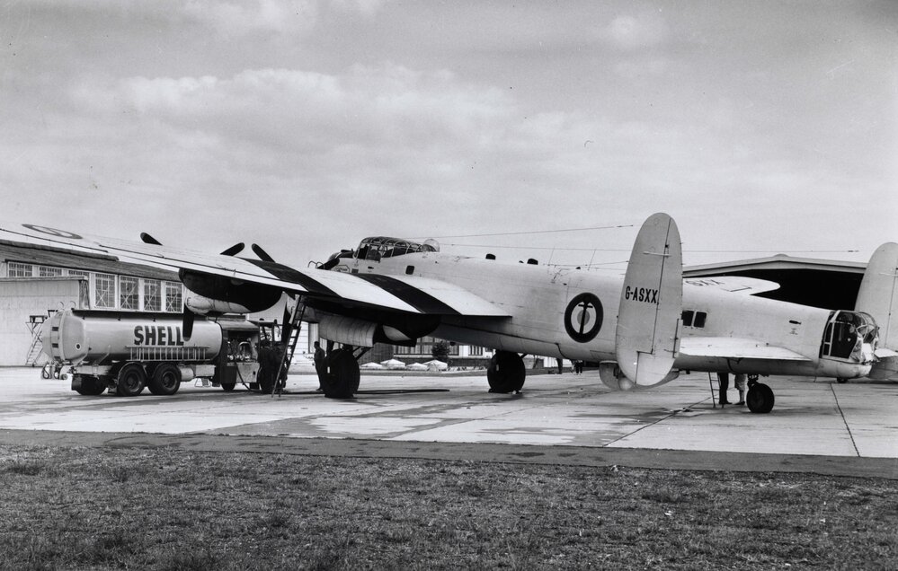 A Leyland Hippo Shell tanker alongside a British Avro Lancaster Type 683 bomber