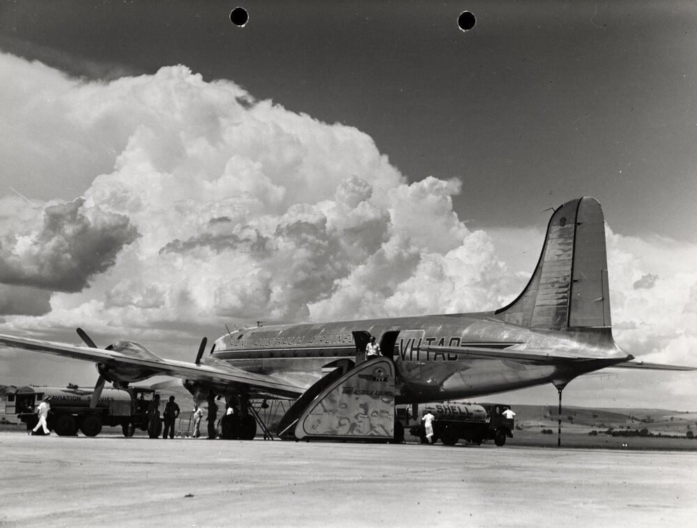 Refuelling a Douglas DC-4 Skymaster at Parafield Aerodrome, Adelaide, South Australia