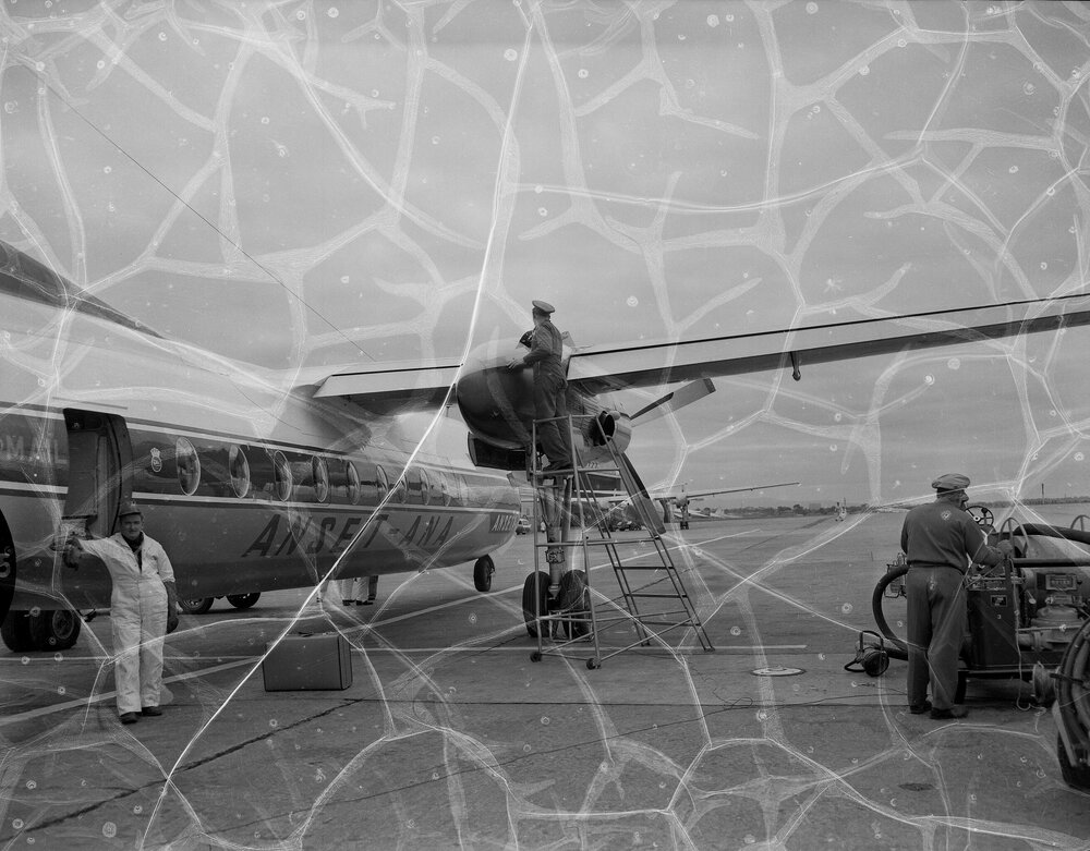 An Ansett-ANA Fokker F27 Friendship being refuelled by Shell Australia workers on the apron of an unidentified Australian airport