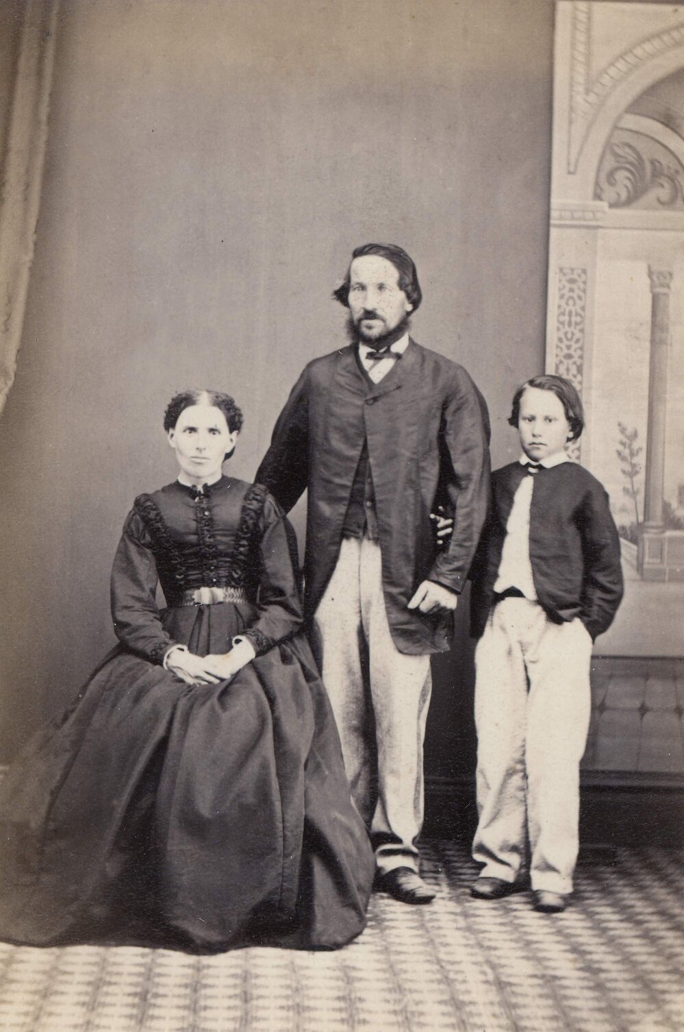 Studio portrait of an unidentified family group.