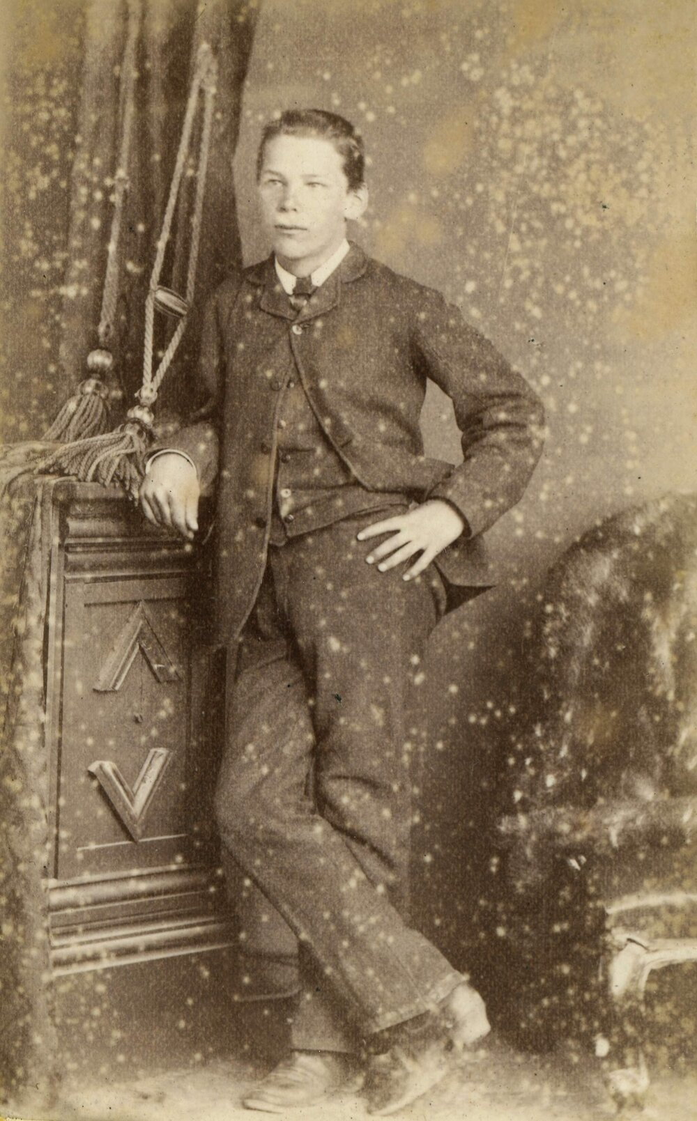 Studio portrait of an unidentified, well dressed young man.