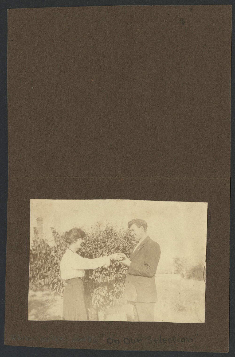 Christian and Napier Waller in front of fruit tree