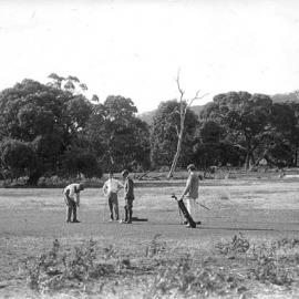 Men playing golf