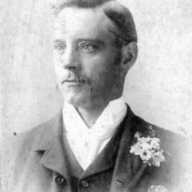Head and shoulders portrait photo of man