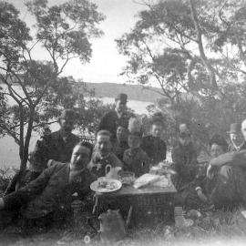 Group photo picnicking in rural setting (Purrembete)