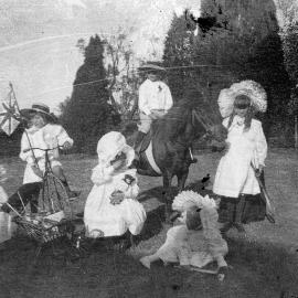 Photo of children playing on lawn