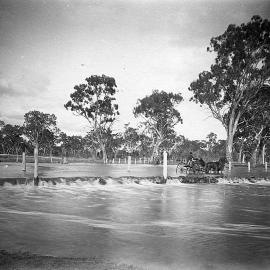 Floodwaters over a road