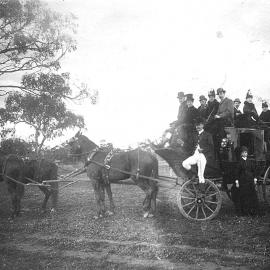 A horse drawn wagon and passengers