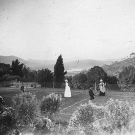 A grassed tennis court