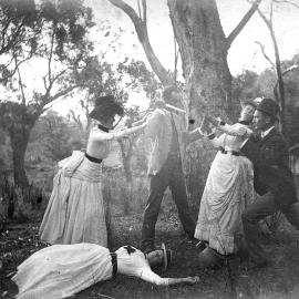 A group of people posing outdoors.