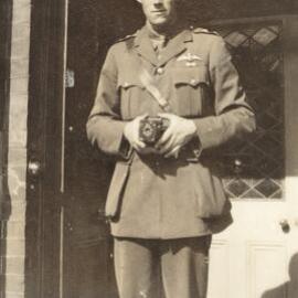 W. R. Keast standing in doorway in military uniform