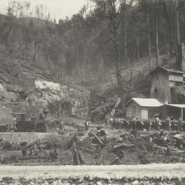 A group of workers at a limestone quarry at Mount Lyell, Tasmania.  Part of the operations of Mount Lyell Mining and Railway Co. Ltd.