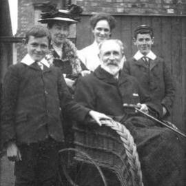 Norman Macgeorge as a child with his parents and brothers