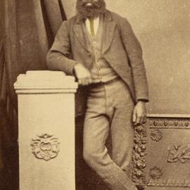 Aboriginal man standing, studio portrait
