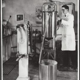 Two pieces of equipment used for processing citrus juices are shown.