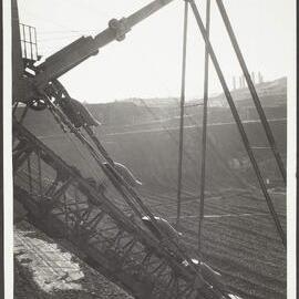 Bucket dredger working on brown coal beds at Yallourn.