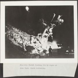 Electric shovel loading ore by night at Iron Knob, South Australia