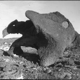 Weathered Kenyte boulder near house, March 8th 1911