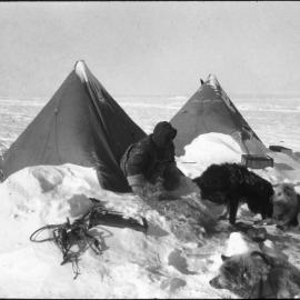 Emerging from tent after a blizzard