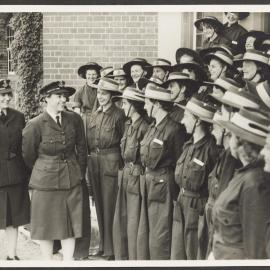 [Photograph: Margaret Blackwood and another WAAAF officer inspecting group of women in uniform]
