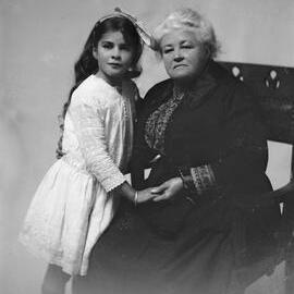 Portrait of an unidentified elderly woman and a girl.