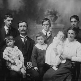 Studio portrait of an unidentified family group.