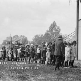 School boys at a Benalla grandstand for the visit of the Governor of Victoria.