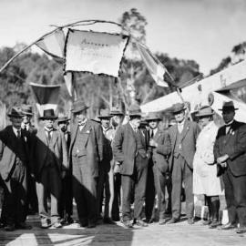 A posed group of men on a bridge near Toombullup.