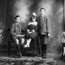 Studio portrait of three children -  family name Hansen.
