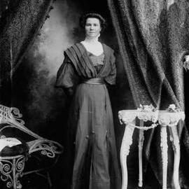 Studio portrait of  Mrs. Watts.