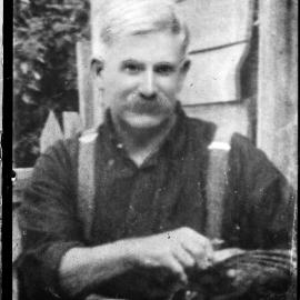 An unidentified man wearing braces.